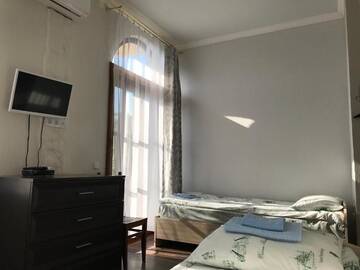 Двухместный номер с 2 отдельными кроватями и душем в Гостевом доме Guest House Evkalipt